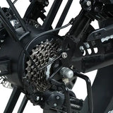 Qmwheel V20 Pro elektrische fatbike in doos, krachtige elektrische fiets met robuuste banden en modern ontwerp.