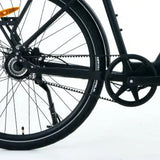Roxx NEO+ e-bike in doos, zwart en zilver, met display en accupakket zichtbaar, klaar voor montage.