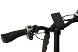 Elektrische fiets Roxx RX1+ van Roxx Bike, in doos, klaar voor montage, met zwart frame en elektrische aandrijving.
