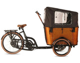 Vogue Avenger Bruin elektrische bakfiets met 3 wielen en middenmotor, geschikt voor comfortabel vervoer.