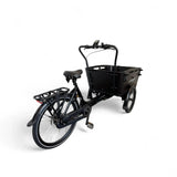 Zwart Vogue Carry 3 elektrische bakfiets met Bafang middenmotor en ruime bak voor kinderopvang of boodschappen.