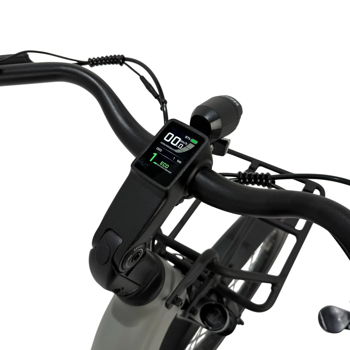 Vogue Artemis grijze elektrische fiets met middenmotor en riemaandrijving, zichtbaar met frame en motoronderdelen in beeld