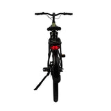 Groene Vogue Milo luxe e-bike met riemaandrijving en Bafang motor, zijaanzicht op een rustig wegdek