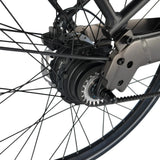 Vogue Nova Man bruine sportieve e-bike met geïntegreerde accu, klaar voor gebruik, in doos.