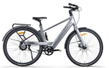 Sportieve grijze Vogue Nova Men e-bike met geïntegreerde accu, klaar voor gebruik, weergegeven in doos.
